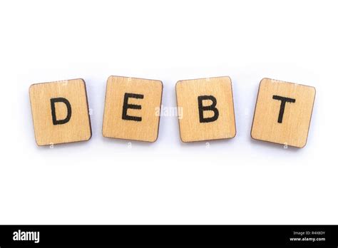 The Word Debt Spelt With Wooden Letter Tiles Stock Photo Alamy