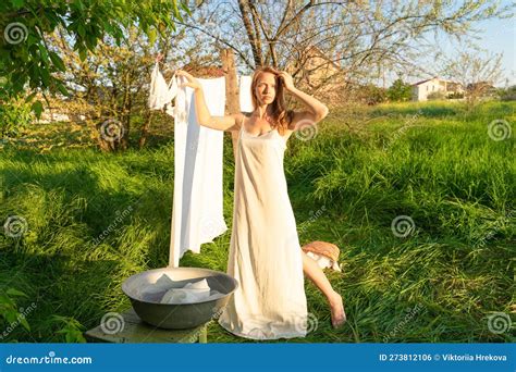 Beautiful Red Girl In Nightievillage Woman Working In Countryside