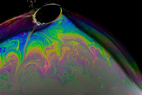 Premium Photo Closeup Shot Of Soap Bubble With Plastic Tube Through