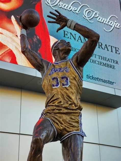 A Statue Of Kareem Abdul Jabbar Shooting A Basketball With His Sky Hook