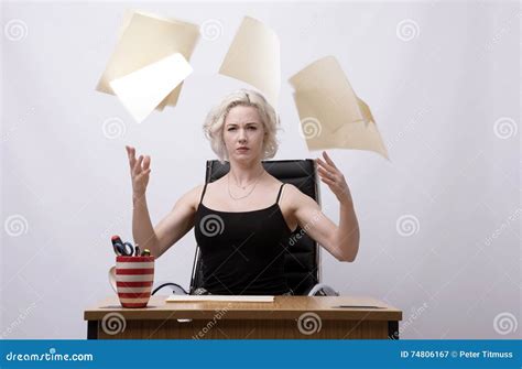 Office Worker Throws Paperwork Into The Air Royalty Free Stock Image