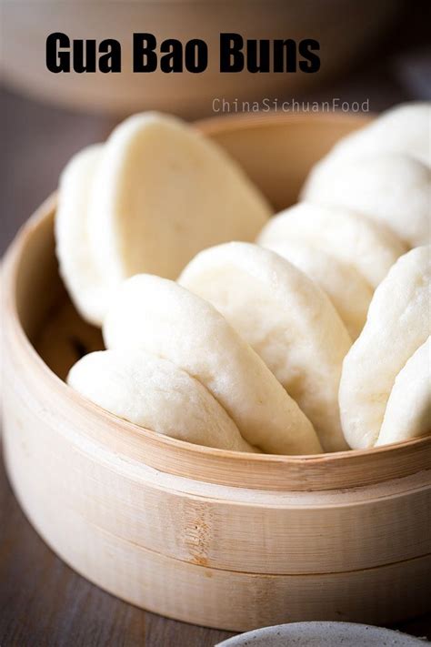 Some Kind Of Food That Is In A Bowl On A Table With The Words Gua Bao