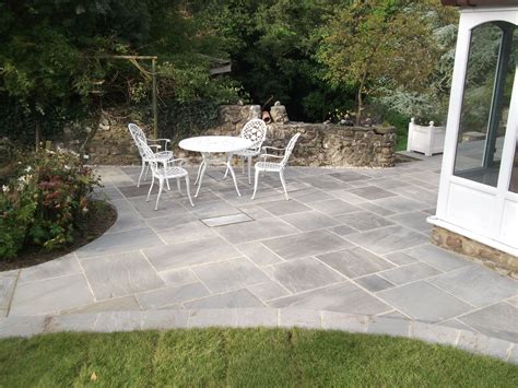 Natural Indian Sandstone In Grey Takes All The Accolade In This Photo Summer House Garden