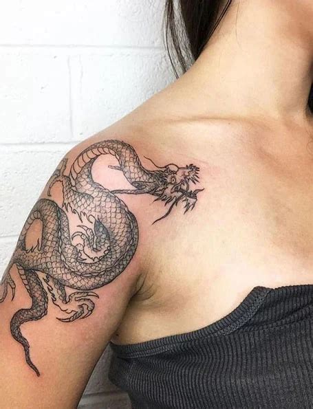 NADINE LUSTRE JUST GOT A LARGE DRAGON TATTOO IN HER RIGHT ARM AND FANS