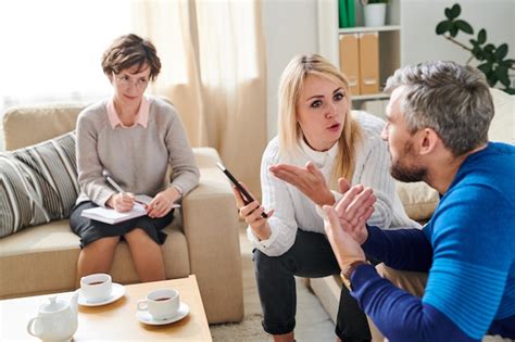 Premium Photo Sad Wife Fighting With Cheating Husband At Therapy Session