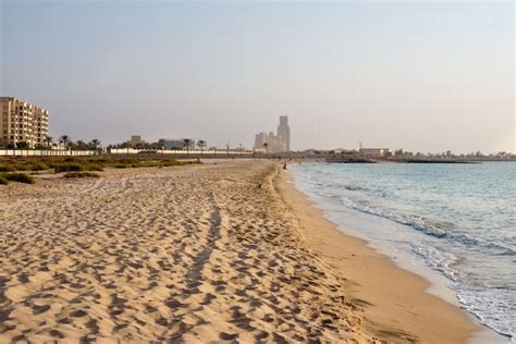 Premium Photo | Al hamra village beach at sunset