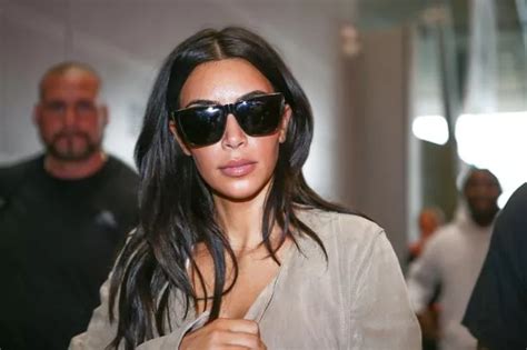 Kim Kardashian Puts On Very Busty Display As She Almost Bursts Out Of