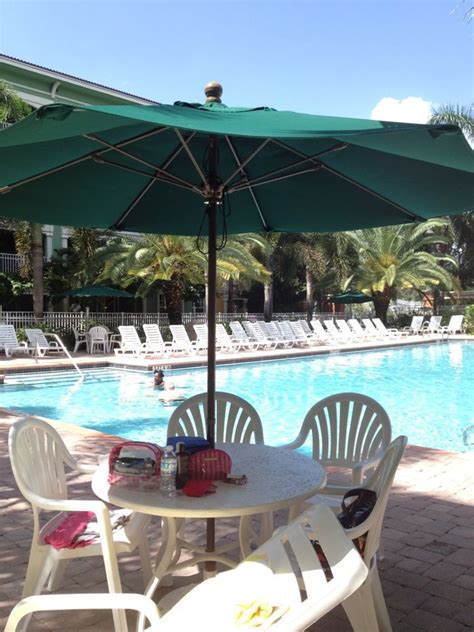 Relaxing at Mizner Place Weston, FL | Weston fl, Poolside, Patio umbrella