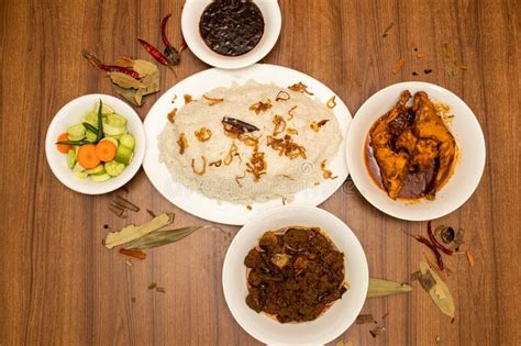 Plain Rice With Fried Onion Beef Rezala Korma Karahi Chicken Korma