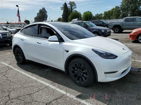 Report Saygaee Pf Tesla Model Y White Electric Price And