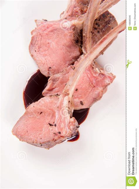 Lamb Chops with Rosemary Sauce Stock Photo - Image of cuisine, cutlery ...