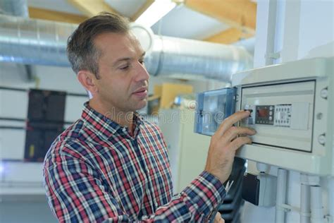 Man Operating Machine Units In Modern Factory Stock Image Image Of