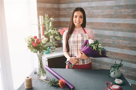 Premium Photo Female Florist At Work Pretty Young Dark Haired Woman