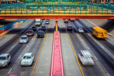 An Overhead View Of Traffic On A Busy Highway