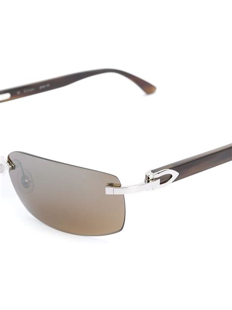 Cartier Eyewear Frameless Sunglasses Farfetch