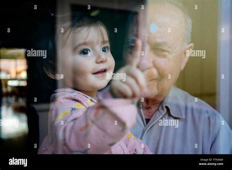 Granddaughter Touching Granddad Telegraph