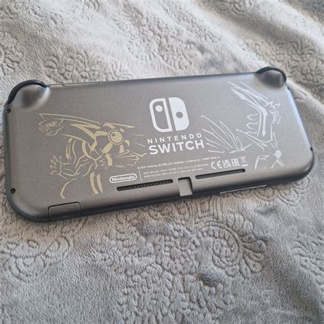 Nintendo Switch Lite Dialga Palkia Edition