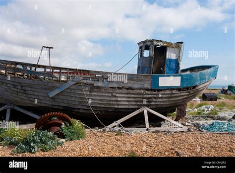 Dilapidated Fishing Boat On The Shingle Beach At Dungeness Kent Uk