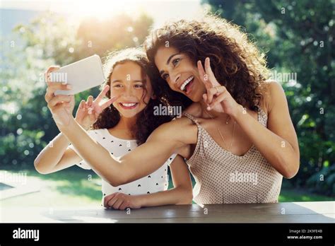 We Always Have The Best Times Together A Young Mother And Her Daughter Taking Selfies Together