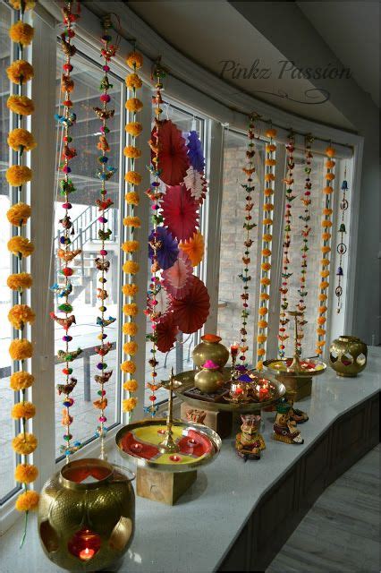 The Table Is Set Up With Decorations And Candles For Diwaling Or Decorating