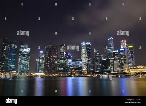 Singapore skyline at night Stock Photo - Alamy