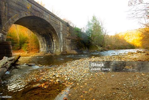 Stone Arch Of A Railroad Bridge Over The Westfield River Stock Photo