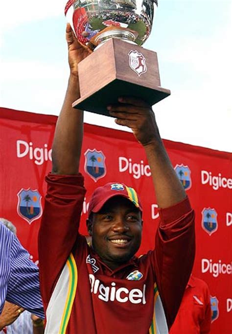 A Victorious Brian Lara Holds The Odi Trophy For All Of Trinidad To See