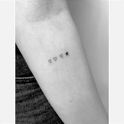 3 HEARTS AND STAR TATTOO The three differently shaped