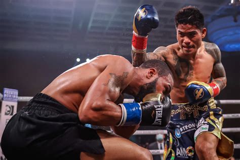 Mark Magsayo Becomes Latest Filipino World Champion Edges Gary Russell Jr Inquirer Sports