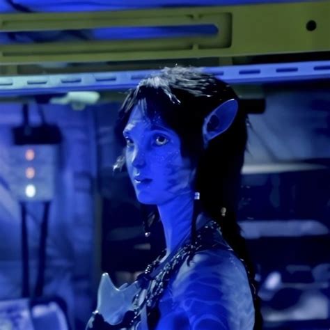 Avatar Movie Fan Art: Stunning Blue Painted Woman in Sci-Fi Setting