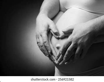 Pregnant Belly Hands Mother Father Making Stock Photo 256921582