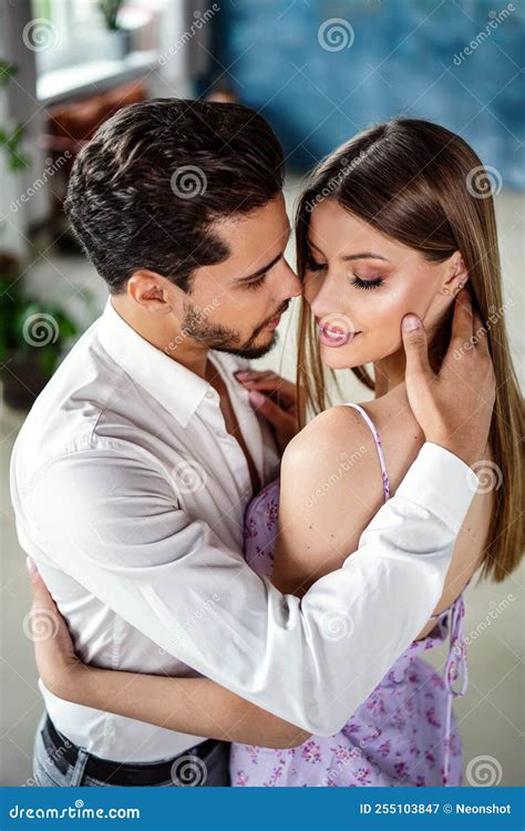 Beautiful Couple In Love Posing Together Hugging Dancing And Smiling