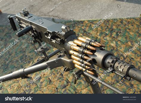 Browning 50 Caliber Heavy Machine Gun With Ammo On Display Stock Photo