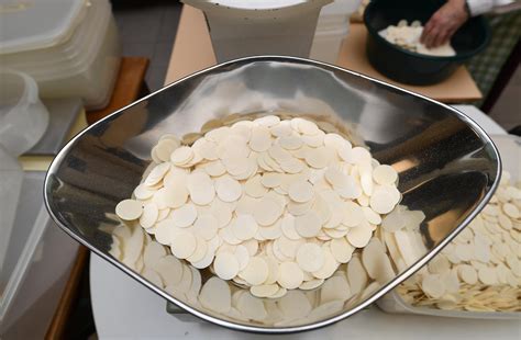 Redemptoristine Sisters Busy Making Communion Wafers In Anticipation Of