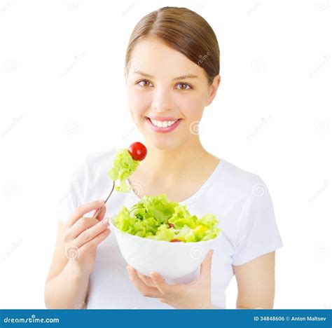 Menina Do Adolescente Que Come A Salada Isolada No Branco Foto De Stock