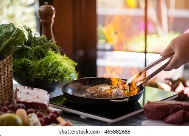 Hand Touching Hot Pan Photos And Images Shutterstock