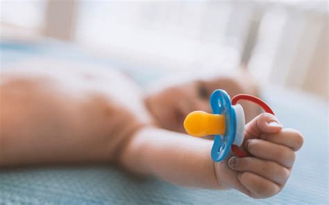 Sucking Your Babys Pacifier Clean Medical Expert Warns Parents Its