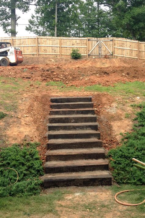 Slope yard slope solutions sloping backyard patio ideas on a budget