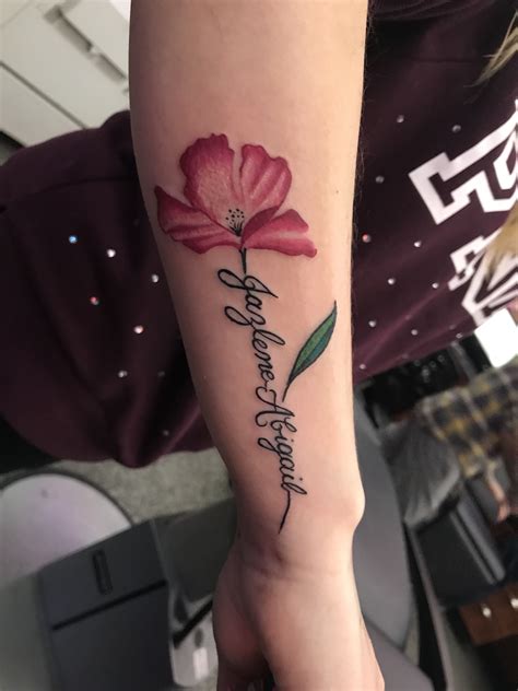 Name Tattoos With Roses On Wrist