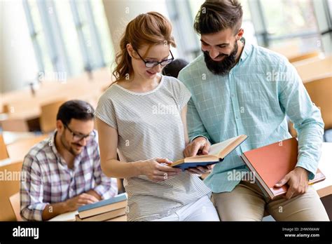 Students Studying In Library Young Success People Are Spending Time