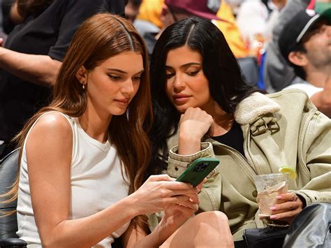 Kylie Jenner Redid Her Sister S Iconic Bikini And Boots Look Who What