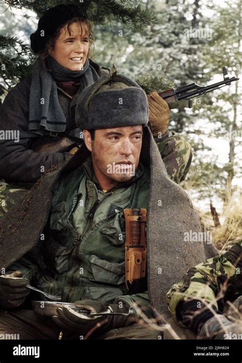 LEA THOMPSON, POWERS BOOTHE, RED DAWN, 1984 Stock Photo - Alamy