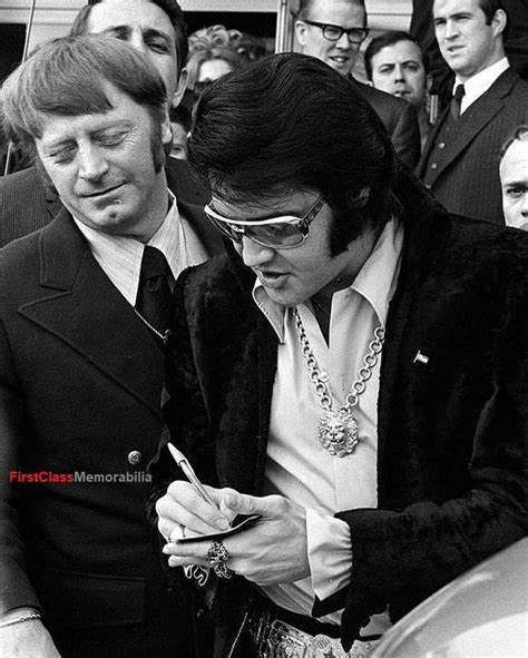 Rare Photos of Elvis Presley Signing Autographs