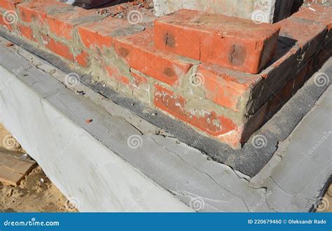 A Close Up Of Bricklaying A House Wall Corner With The First Course Of