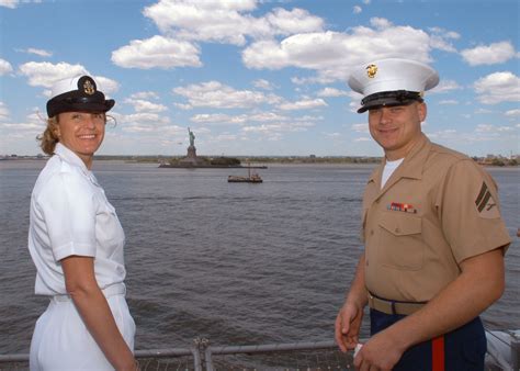 A US Navy USN Sailor And A Embarked US Marine Corps USMC Marine