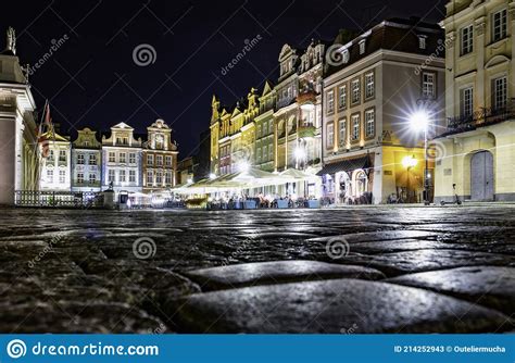 Poznan Poland Old Town By Night Cityscape And Colorful Lights Of