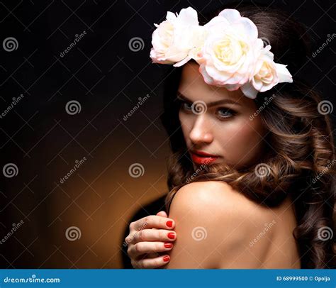 Beautiful Young Woman With Summer Pink Flowers Long Permed Curly Hair