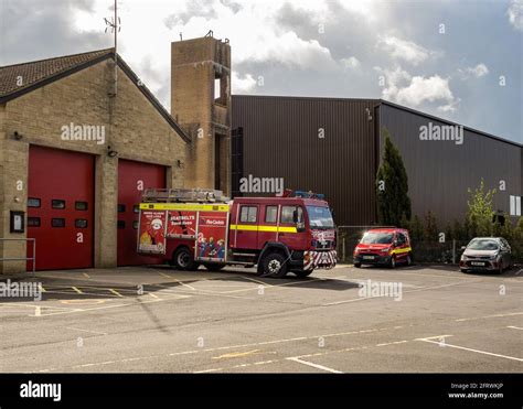 The Front Of A British Fire Station With One Fire Engine Parked Outside