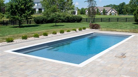 The Illusion Fiberglass Swimming Pool With Splash Pad Imagine Pools