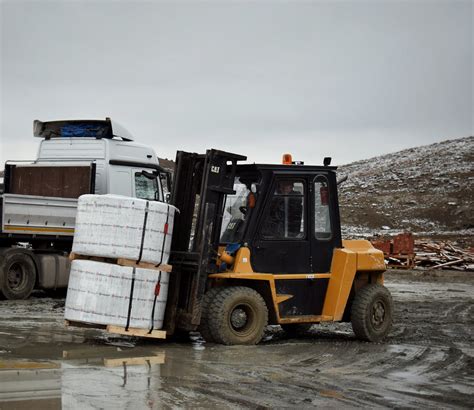 Forklift Loading Truck · Free Stock Photo